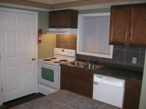 Kitchen in 3312 Howard St, DiBar Enterprises.