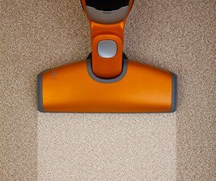 Carpet Cleaning — Vacuuming Carpet in Colorado Springs, CO Carpet Cleaning — Vacuuming Carpet in Colorado Springs, CO