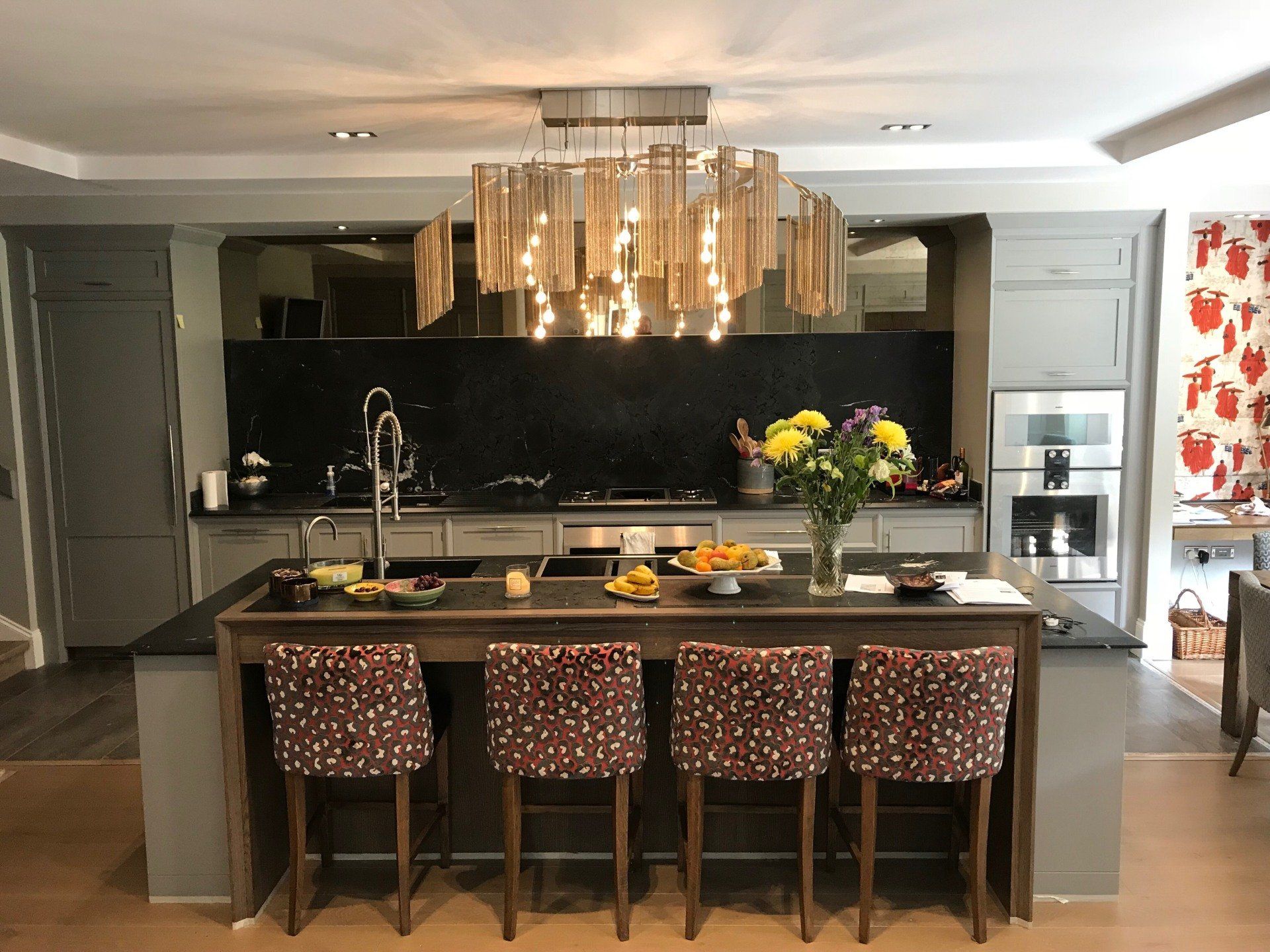 Kitchen island with a feature light above