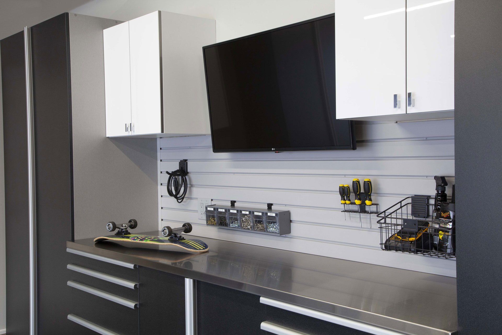 Stainless Steel Workbench and White Garage Cabinets