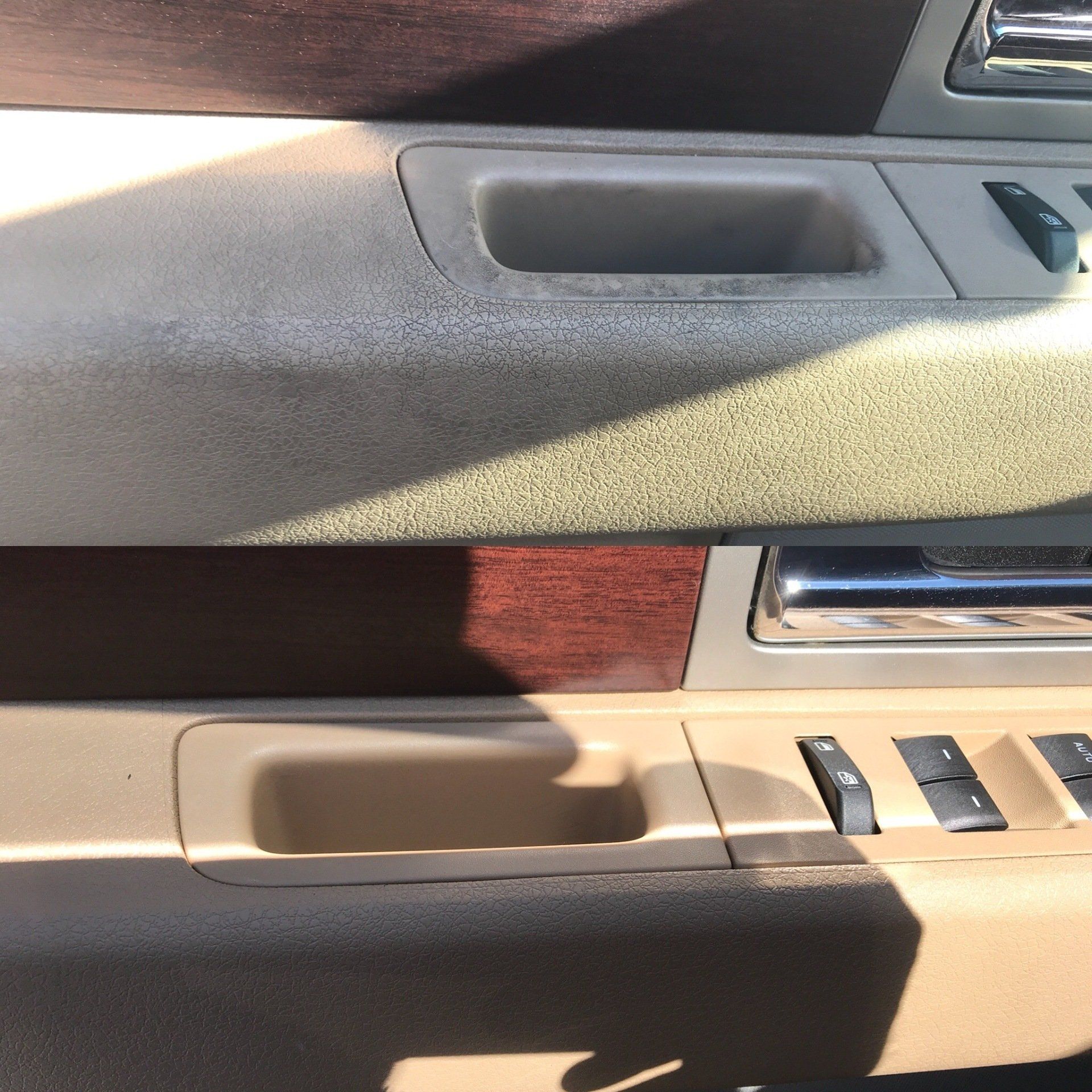 a close up of a car door with a shadow on it
