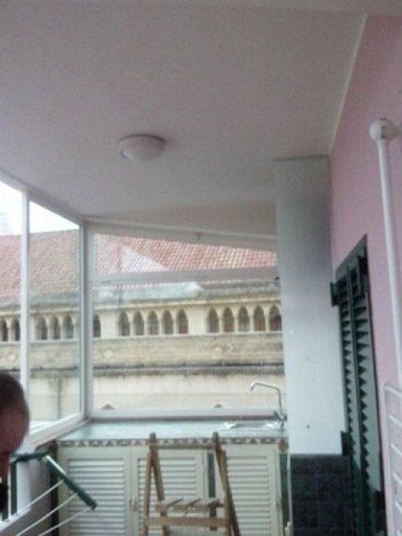 balcone chiuso con vetrate