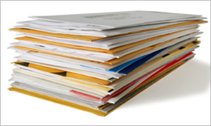 pile of letters on a white table