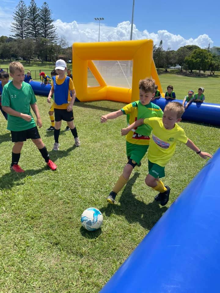 Kids Playing Football — Football Clubs in Kingscliff, NSW Kids Playing Football — Football Clubs in Kingscliff, NSW