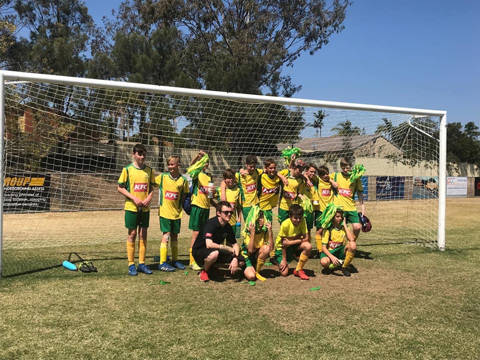 Football Team On The Football Field — Football Clubs in Kingscliff, NSW
