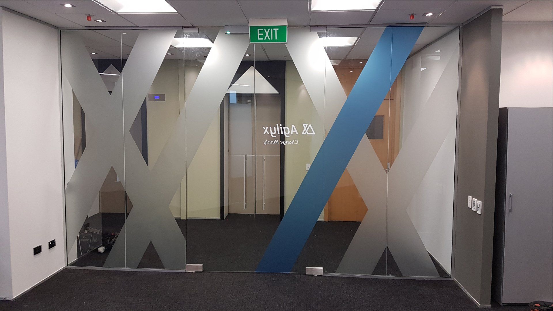 Digitally printed window etch films applied to office glazing