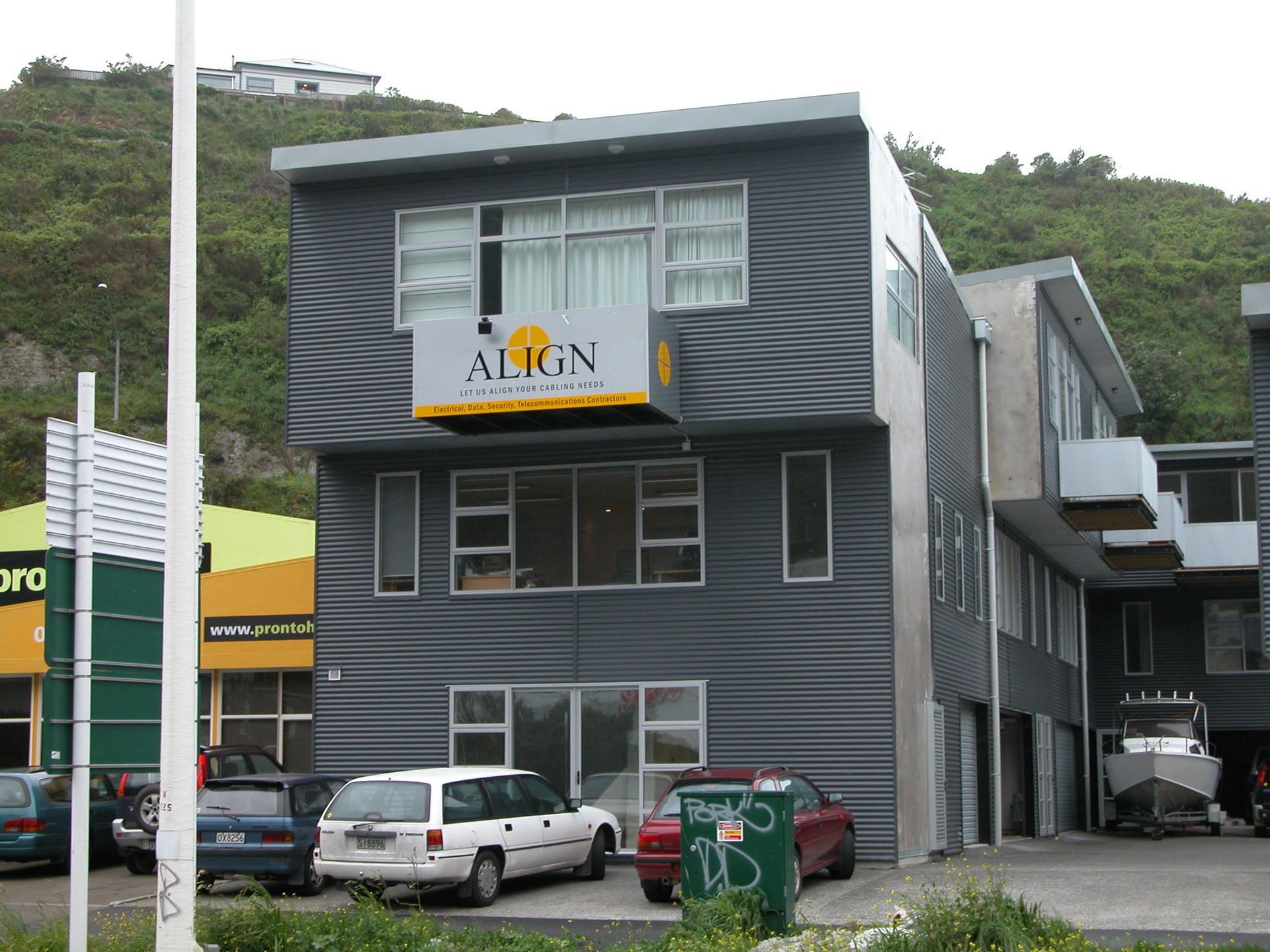 ACM sign installed onto building