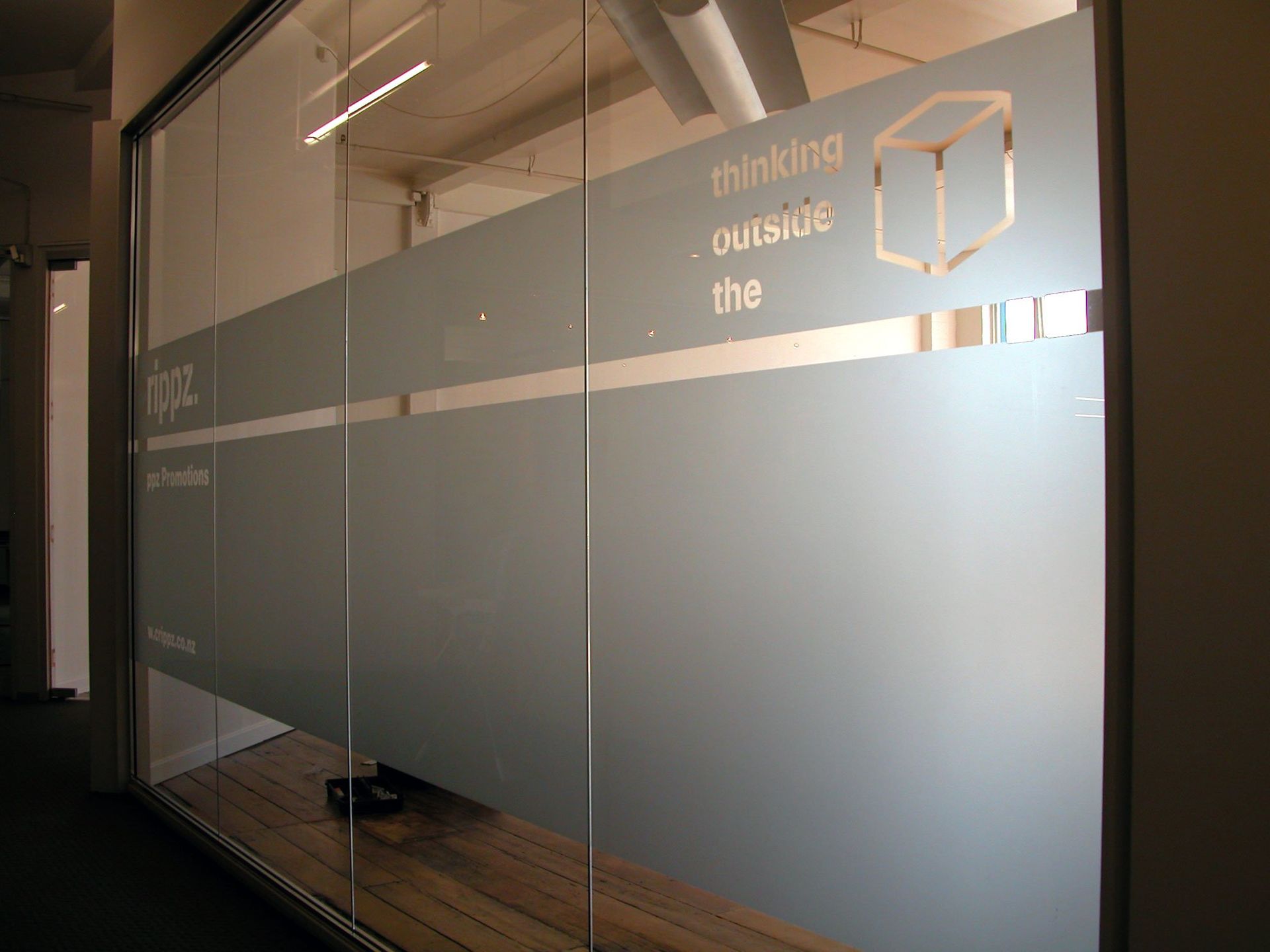 Window etch film applied to office glazing
