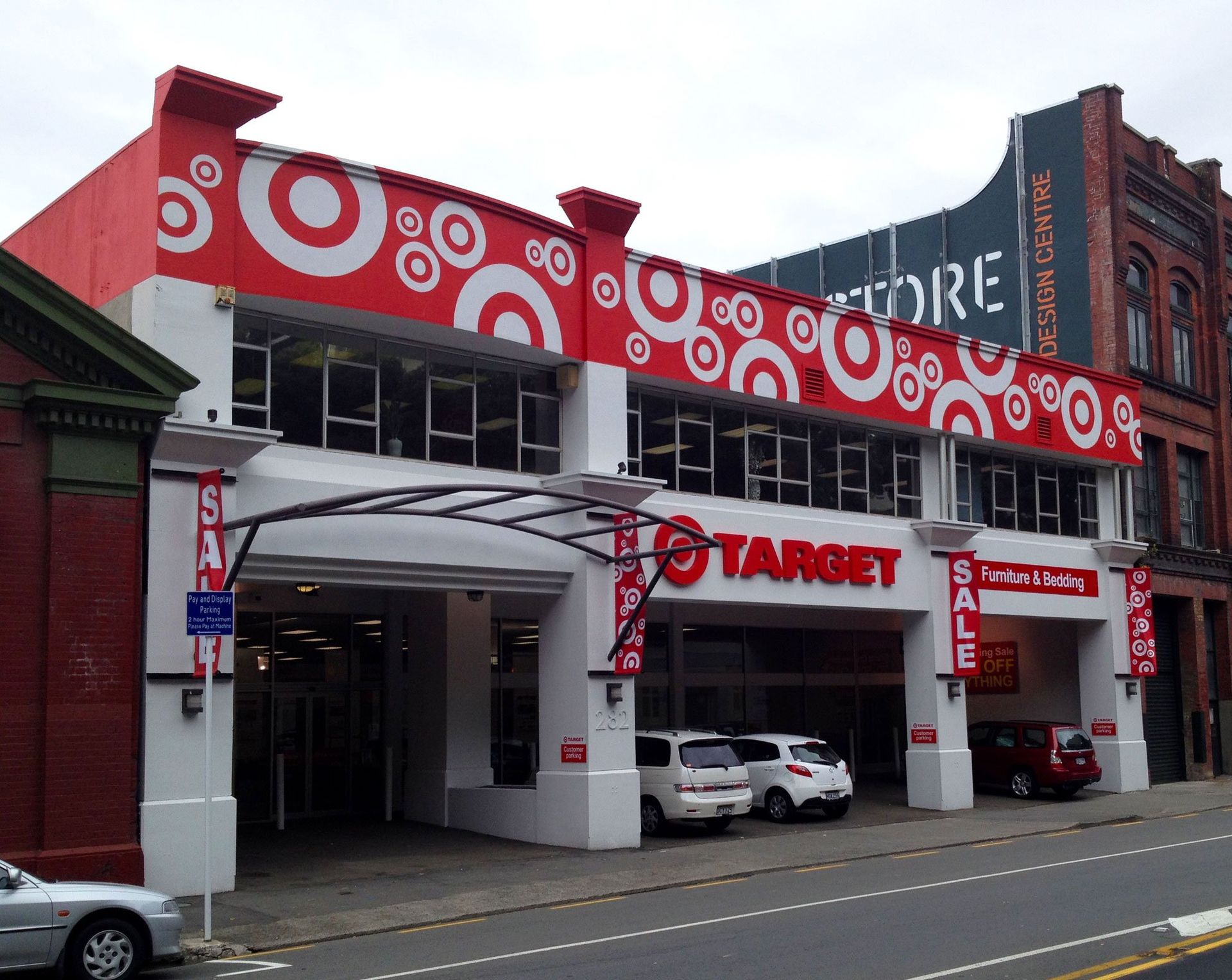 3 dimensional letters on fascia, banners and hand painted circle design