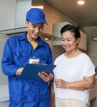Friendly Technician Talking To Client — Dyer, IN — Anderson Appliance Repair