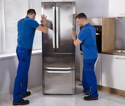 Two Workers Moving the Refrigerator | Dyer, IN | Anderson Appliance Repair