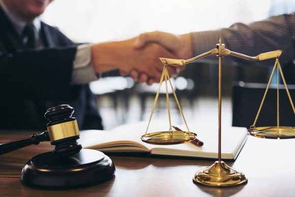 shaking hand with the lawyer