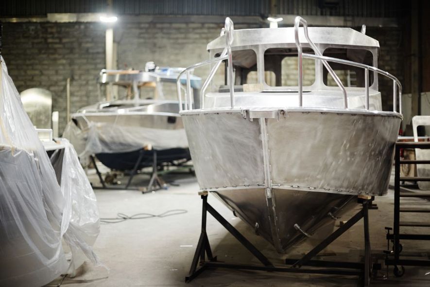 Boats stopped at construction site for survey