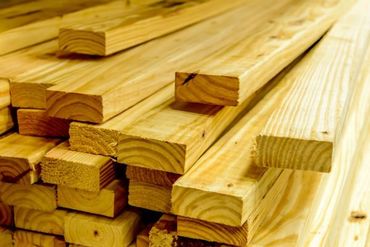 Building supplies, stacked wood boards