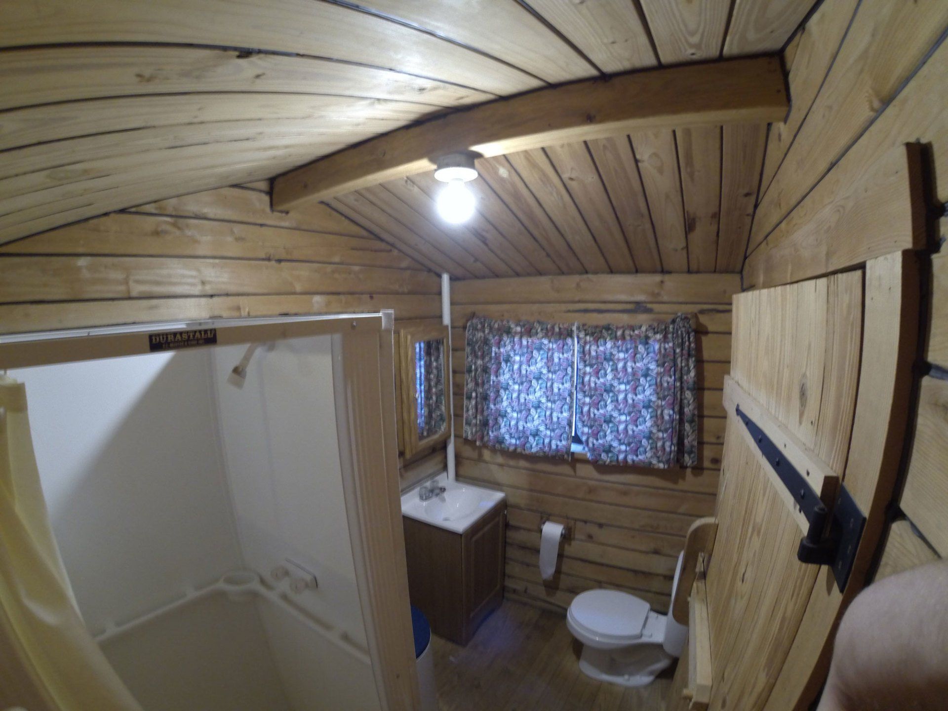 Interior view of restroom in cabin at High Rock Lake Campground