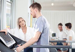 Therapist With Patient On Treadmill — Reno, Nevada — ATS Physical Therapy