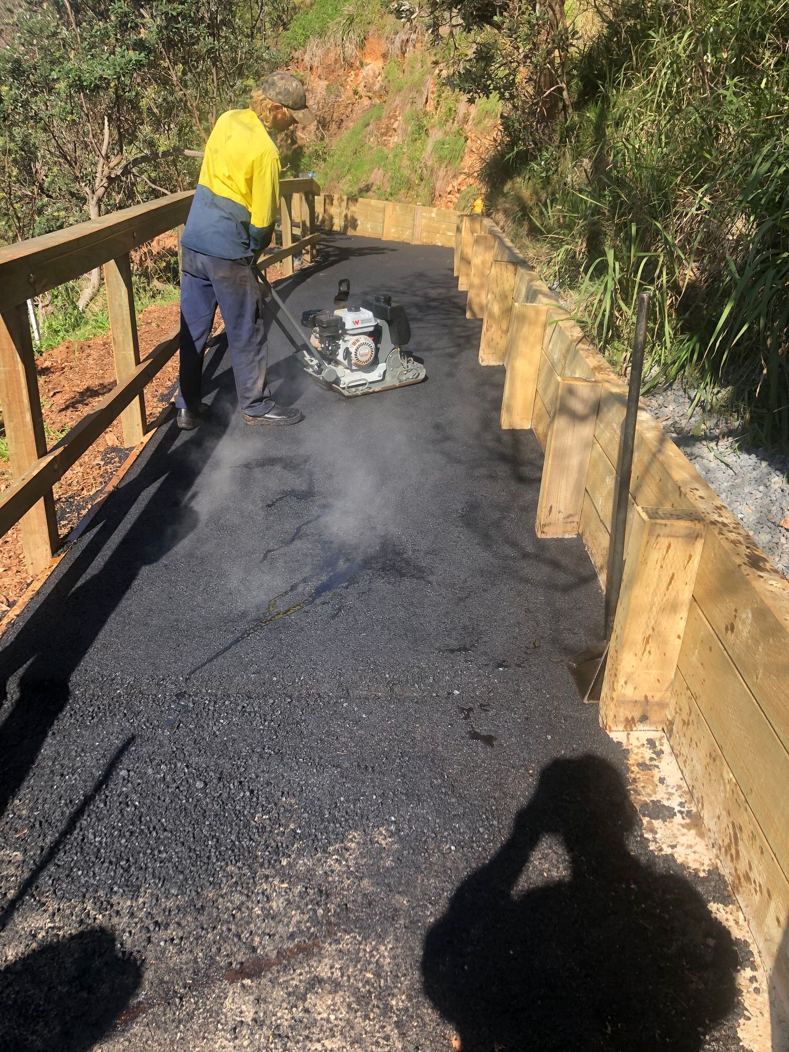 Laying Asphalt on Walkway