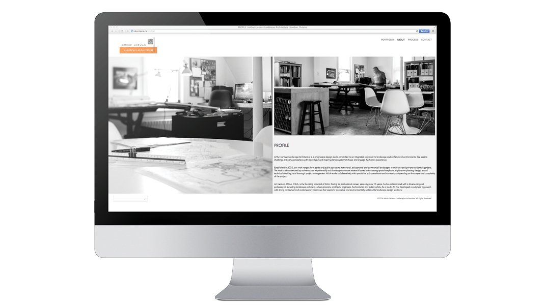 A computer screen displaying a black and white interior design blog.