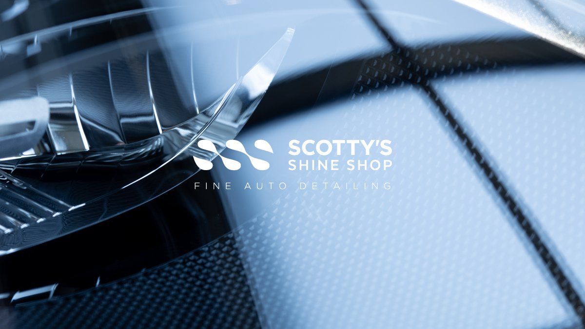 Logo for Scotty's Shine Shop, metallic and reflective detailing with a blue backdrop.