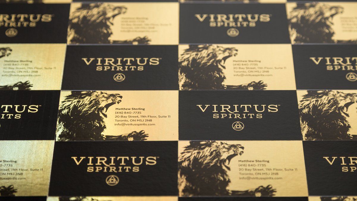 Business cards with black and gold design: 