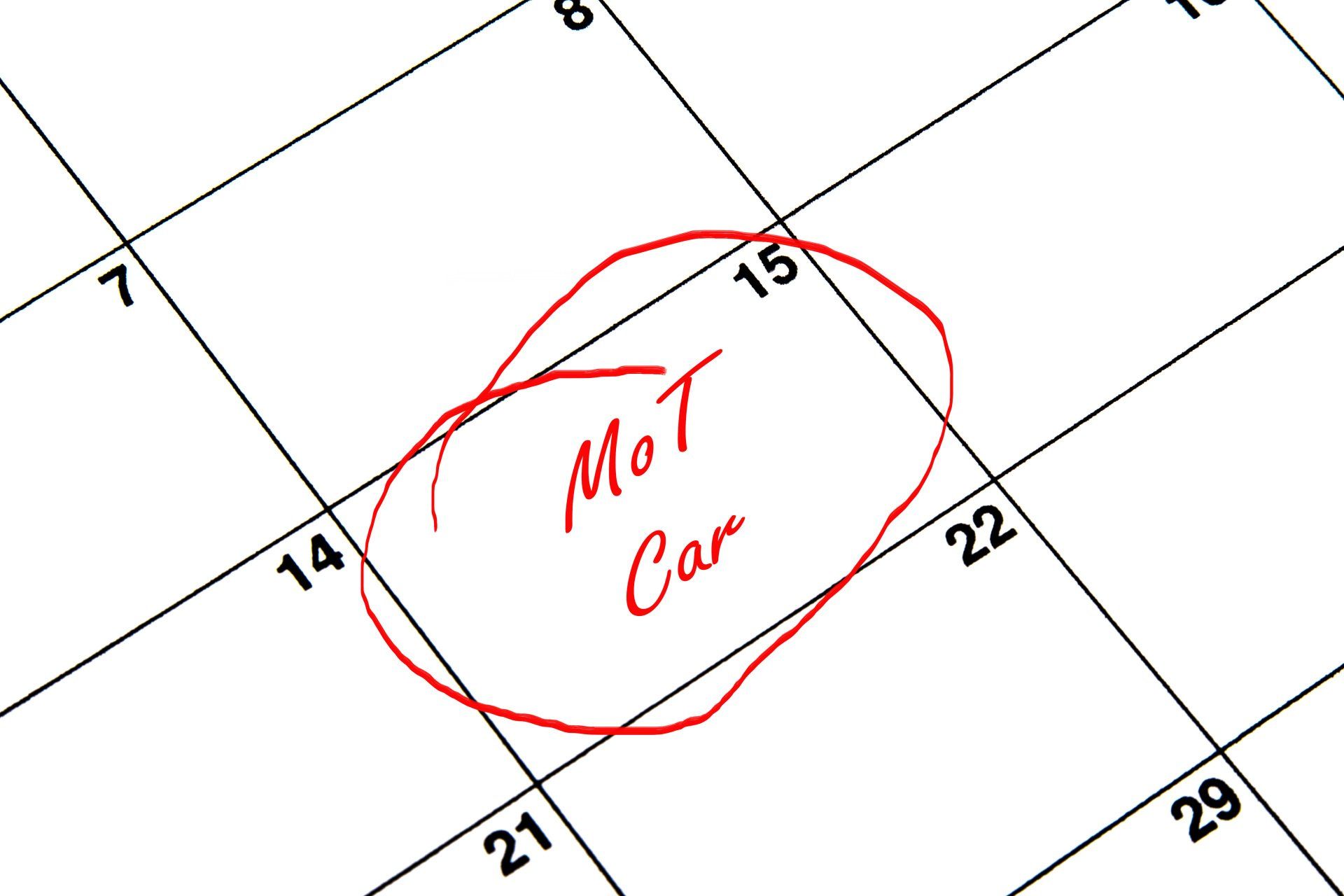 A calendar with the word mot car circled in red