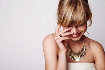 Woman Smiling — Quality Jewelry in Charlotte, Michigan Woman Smiling — Quality Jewelry in Charlotte, Michigan