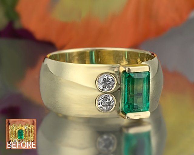 A yellow gold ring with an emerald and diamonds