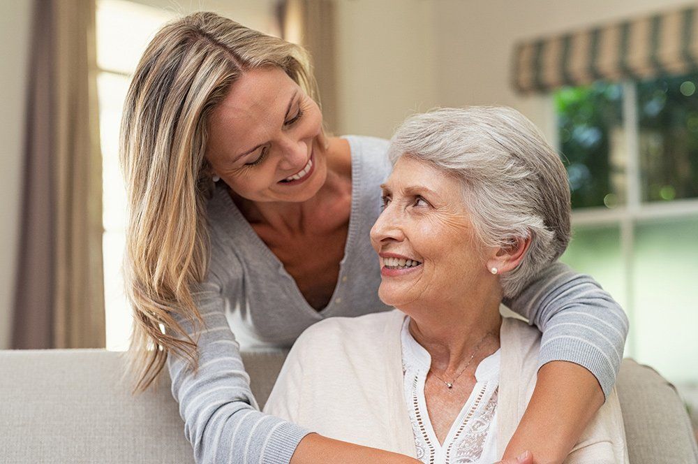 Hospice Care — Woman Embracing Senior Mother in Columbus, OH Hospice Care — Woman Embracing Senior Mother in Columbus, OH