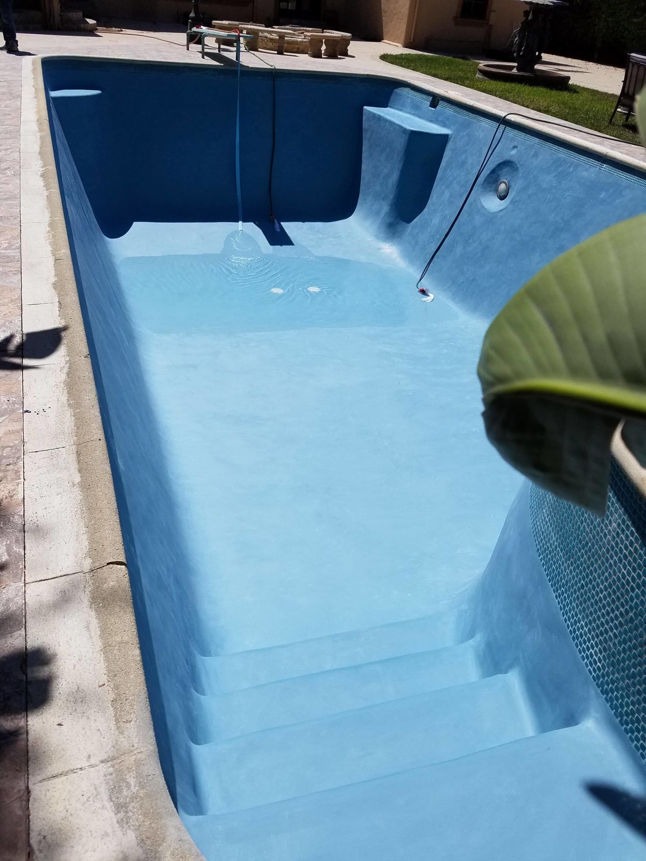 Woman Swimming In The Pool — Swimming Pool Renovation in Sylmar, CA