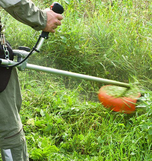 Man Holding Drill Tool