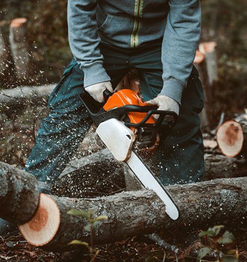 Man Holding Drill Tool