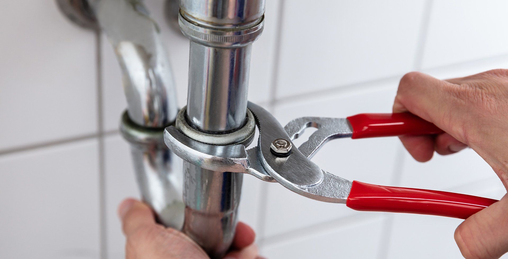 Plumber Fixing Sink Pipe Plumber Fixing Sink Pipe