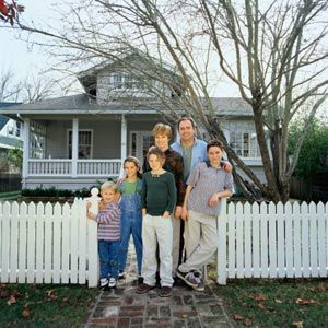 family in front of house family in front of house