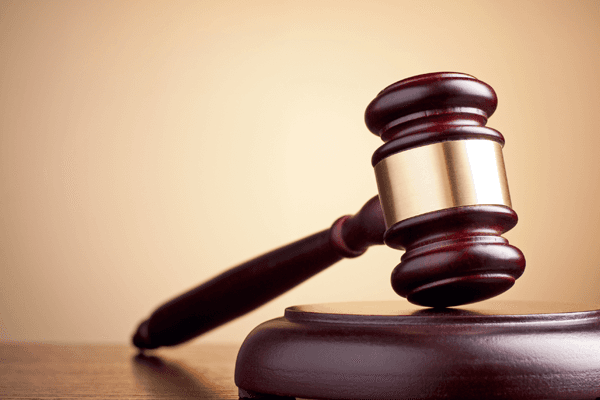 Brown gavel on the table