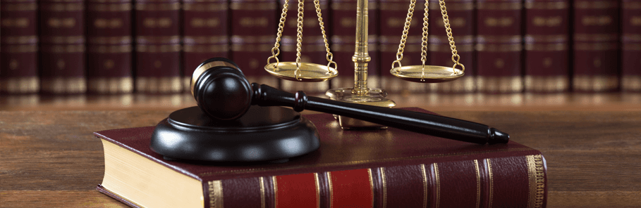 Gavel and scale on the law book