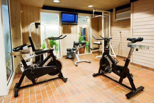 There are two exercise bikes in the gym.