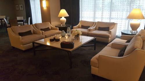 A living room filled with furniture and a coffee table.