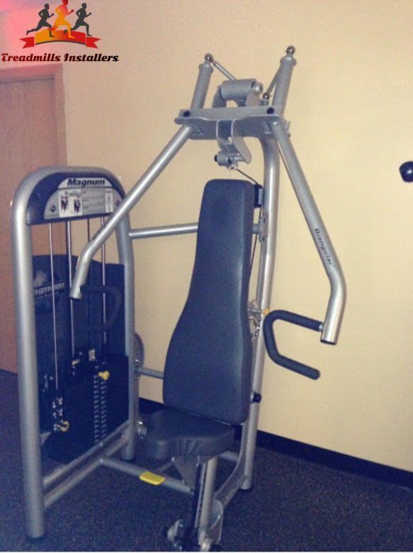 A machine in a gym with a sign that says ernestville entrepreneurs