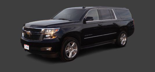 Black SUV on a gray background.