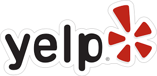 Yelp logo with black text and a red starburst icon, outlined in white on a white background.
