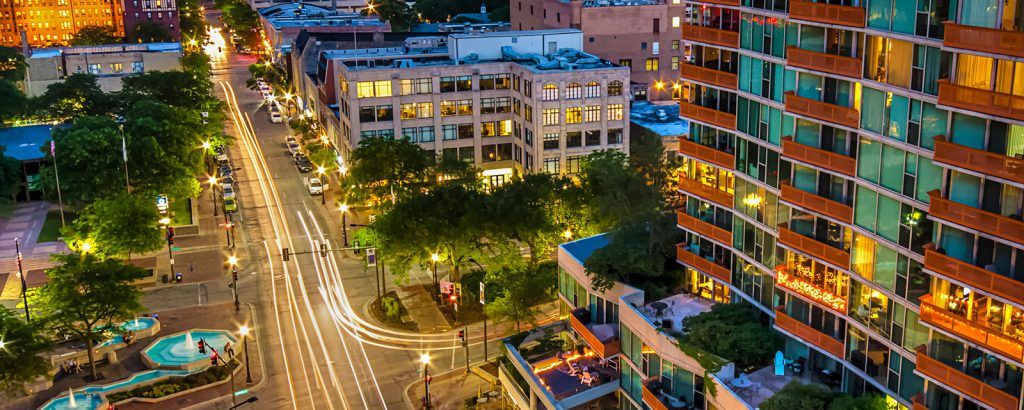 An aerial view of a city street at night.