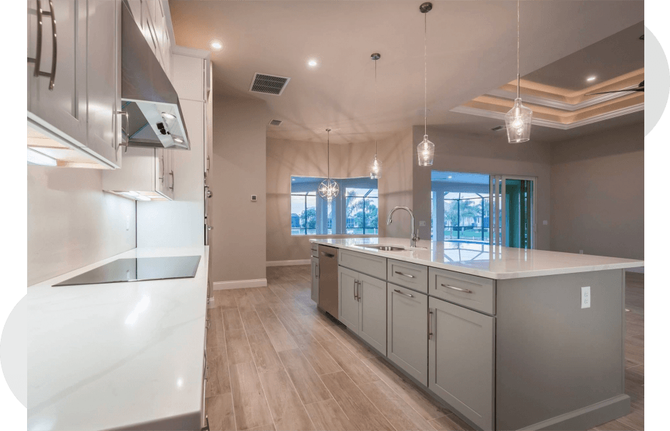 Shaker cabinetry with Euro pulls and white quartz countertops. Tray ceiling new construction
