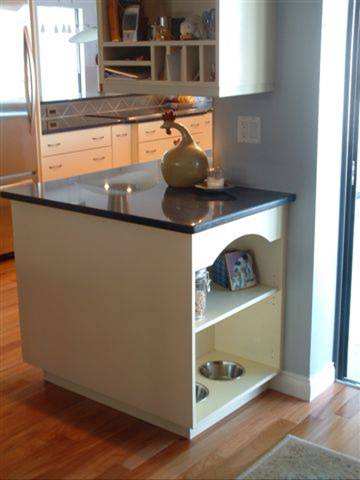 Creative dog bowl inserts for end of cabinetry run. 