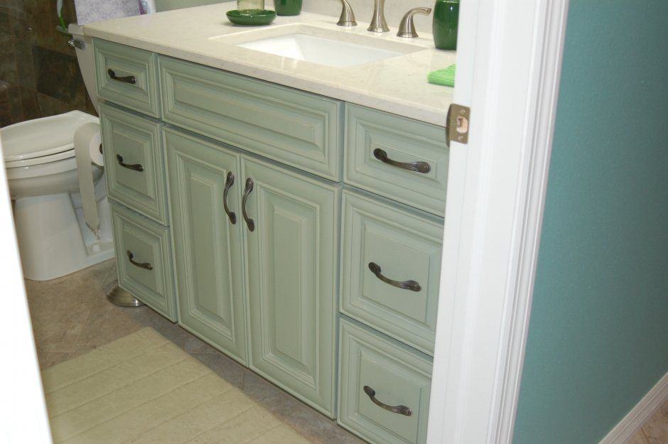 Raised panel vanity cabinets with drawers. Quartz countertop bathroom remodel project.