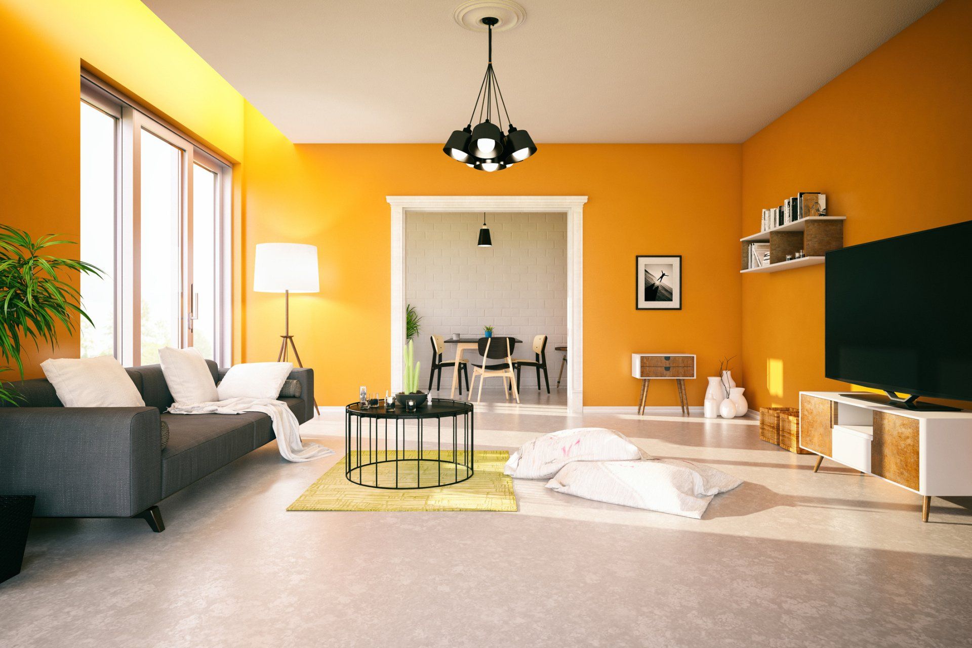 A living room with painted orange walls 