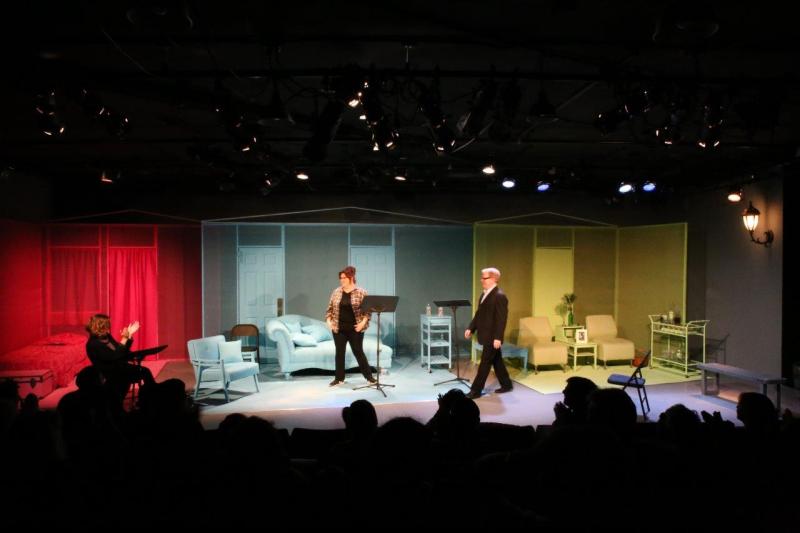 Audience applauding  actors and director after play reading.