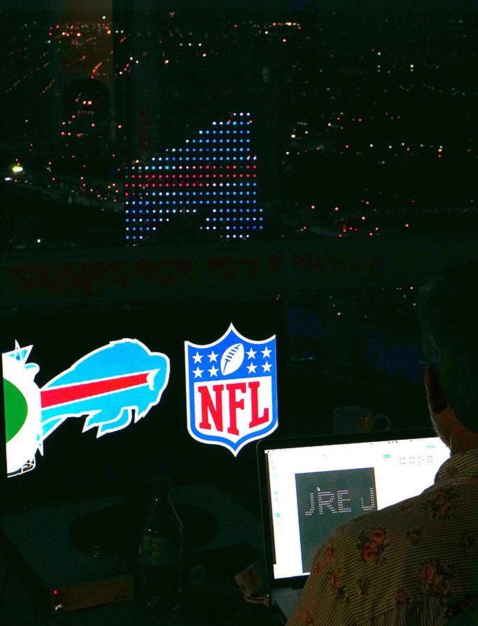 CIRA Tower, Philadelphia. With an NFL logo custom fit to the lights scrolling by.
