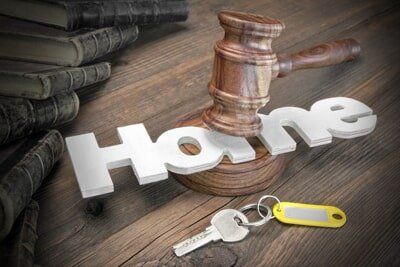 Sign Home, Door Key, Judges Or Auctioneer Gavel And Old Law Book On The Wood Table — Attorney in Miami, FL Sign Home, Door Key, Judges Or Auctioneer Gavel And Old Law Book On The Wood Table — Attorney in Miami, FL