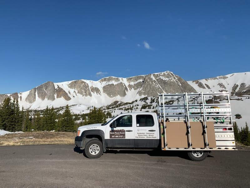 A Truck with Mountains on the Background — Laramie, WY — Snowy Range Glass