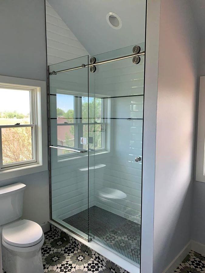 Shiny Glass Shower Door — Laramie, WY — Snowy Range Glass
